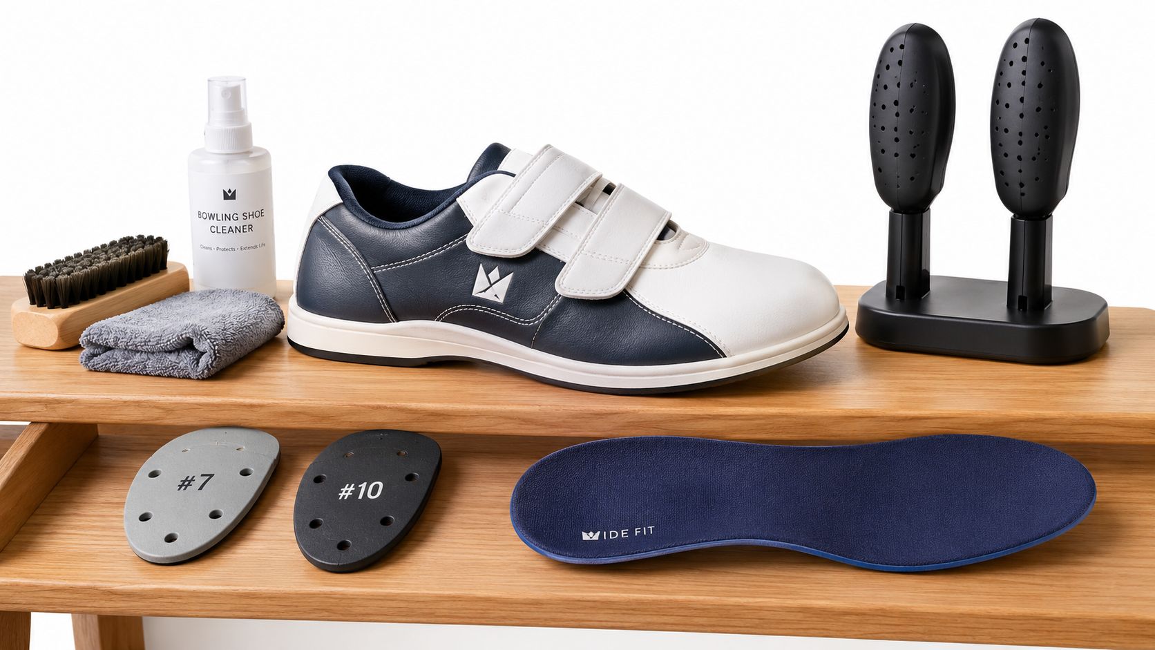 A professional bowling shoe cleaning and maintenance kit including a wide width bowling shoe on a wooden surface.